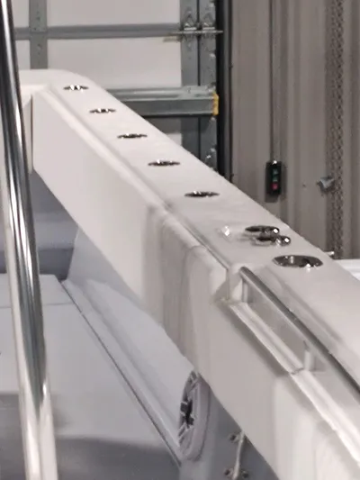  Yacht Photos Pics 2024 Contender 39 ST boat detail with sleek white design and metal fixtures.