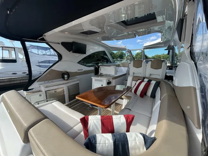  Yacht Photos Pics Luxurious 2014 Four Winns V435 yacht interior with plush seating and elegant design.