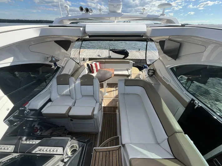  Yacht Photos Pics 2014 Four Winns V435 yacht interior with spacious seating and modern design on a sunny day.