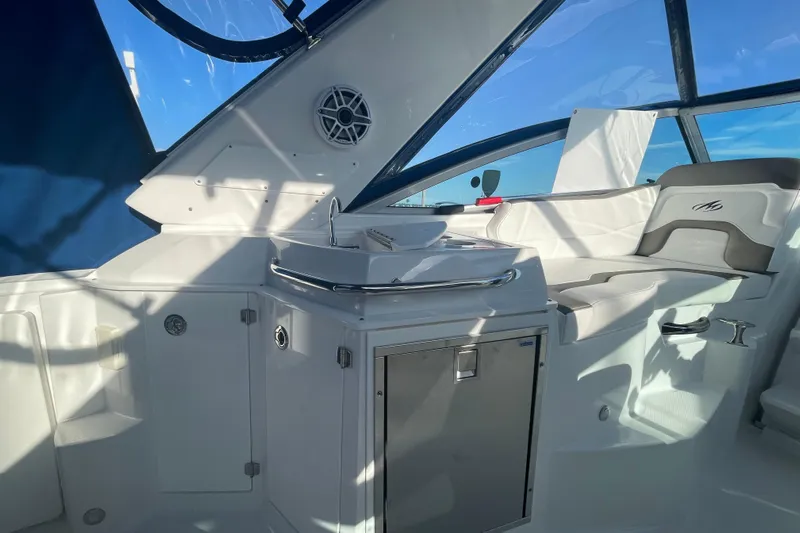  Yacht Photos Pics Interior of 2019 Monterey 295 Sport Yacht with sleek seating and modern amenities.