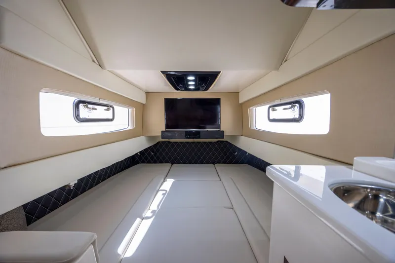  Yacht Photos Pics Luxurious interior of 2019 Scout 420 LXF yacht with modern amenities and sleek design.