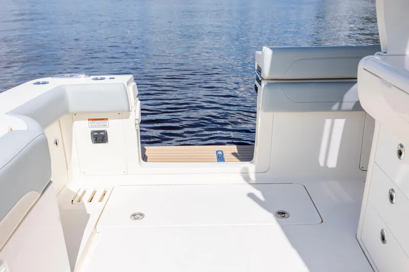  Yacht Photos Pics 2019 Scout 420 LXF boat interior with seating and water view.