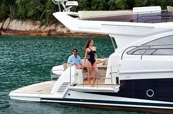  Yacht Photos Pics Luxury Schaefer 510 GT Pininfarina yacht cruising on serene waters, 2026 model.