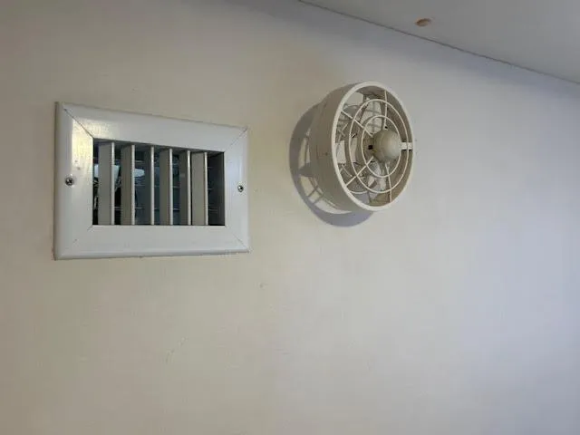  Yacht Photos Pics Vent and fan on Lagoon TPI 37 yacht interior wall, 1995 model.