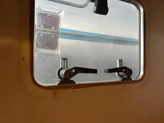  Yacht Photos Pics Window view from inside a 1995 Lagoon TPI 37 boat cabin.