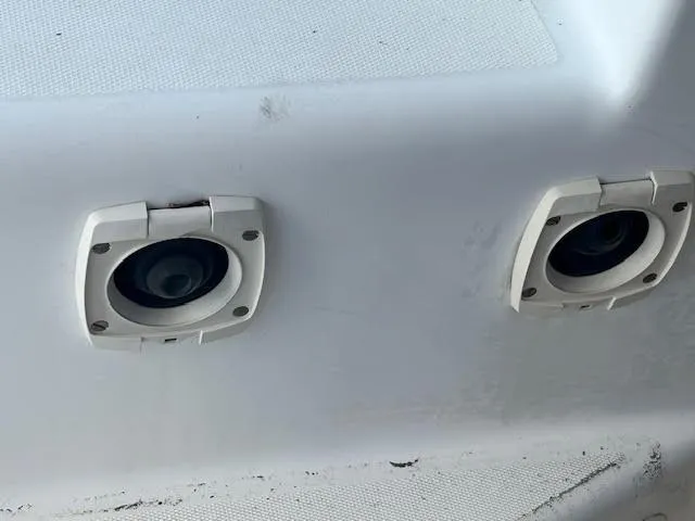  Yacht Photos Pics Two circular fixtures on a 1995 Lagoon TPI 37 boat surface.