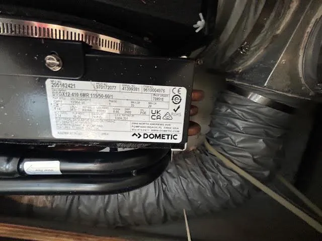  Yacht Photos Pics Dometic appliance label inside a 1995 Lagoon TPI 37 yacht, showing specifications and certifications.