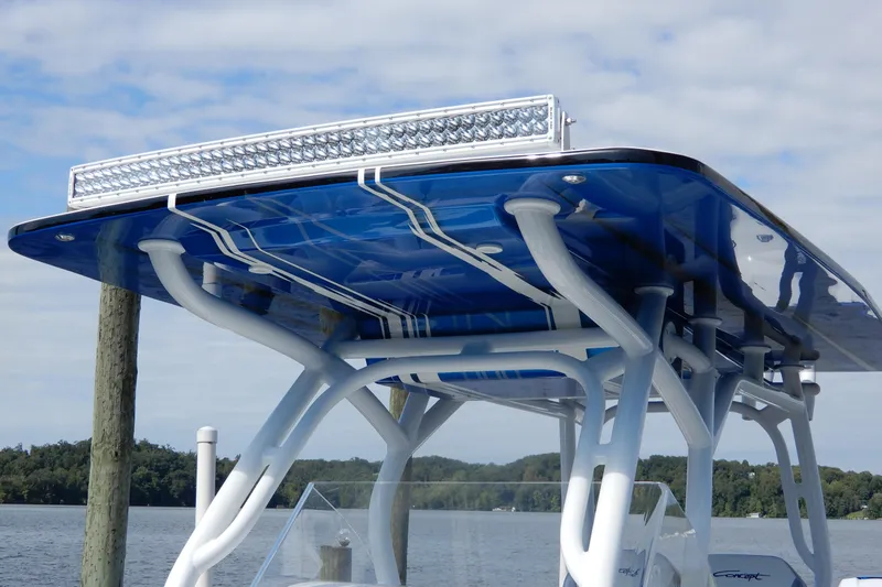  Yacht Photos Pics 2021 Concept 32' Open Deck boat with sleek blue canopy and LED light bar.