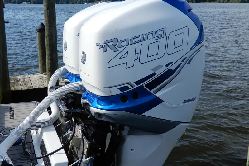  Yacht Photos Pics 2021 Concept 32' Open Deck with twin Racing 400 outboard engines on a lake.