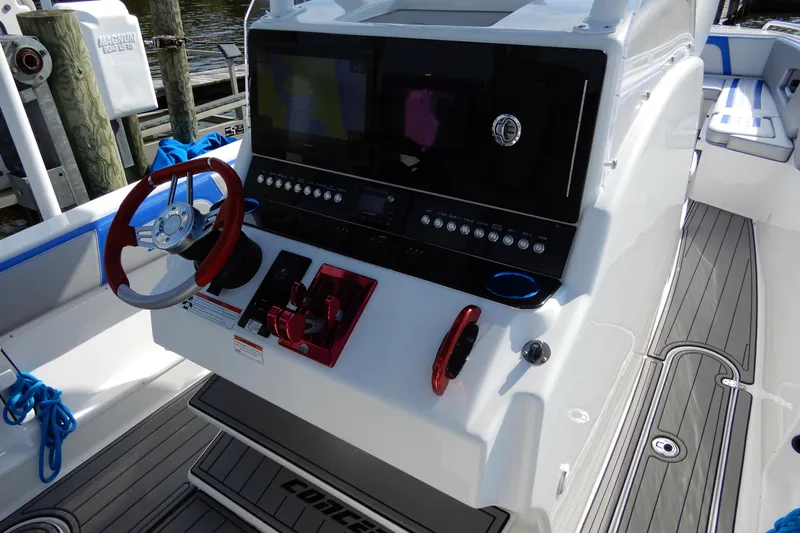  Yacht Photos Pics 2021 Concept 32' Open Deck boat with modern helm and red steering wheel.