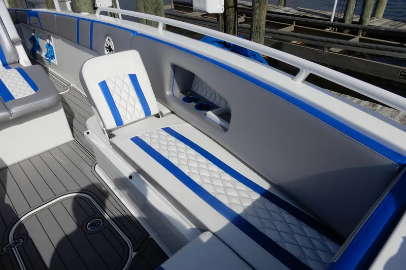  Yacht Photos Pics Luxurious seating on 2021 Concept 32' Open Deck boat with blue and white accents.