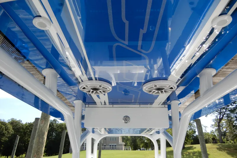  Yacht Photos Pics Blue and white underside of 2021 Concept 32' Open Deck boat with speakers.