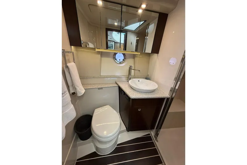 Osa Yacht Photos Pics Luxurious bathroom in 2012 Cruisers Yachts 41 Cantius, featuring modern fixtures and elegant design.