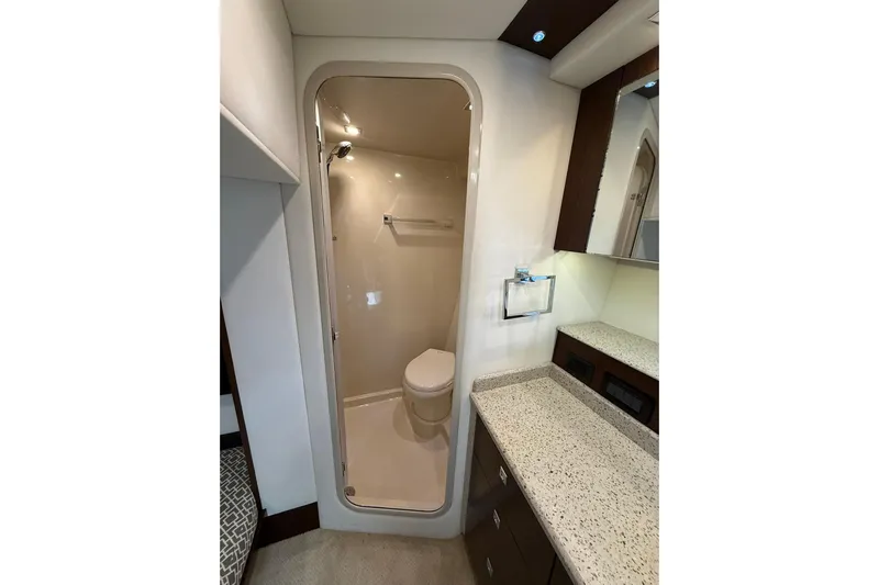 Osa Yacht Photos Pics Luxurious bathroom in 2012 Cruisers Yachts 41 Cantius with modern fixtures and elegant design.