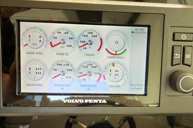Osa Yacht Photos Pics Dashboard of a 2012 Cruisers Yachts 41 Cantius showing engine and fuel gauges.