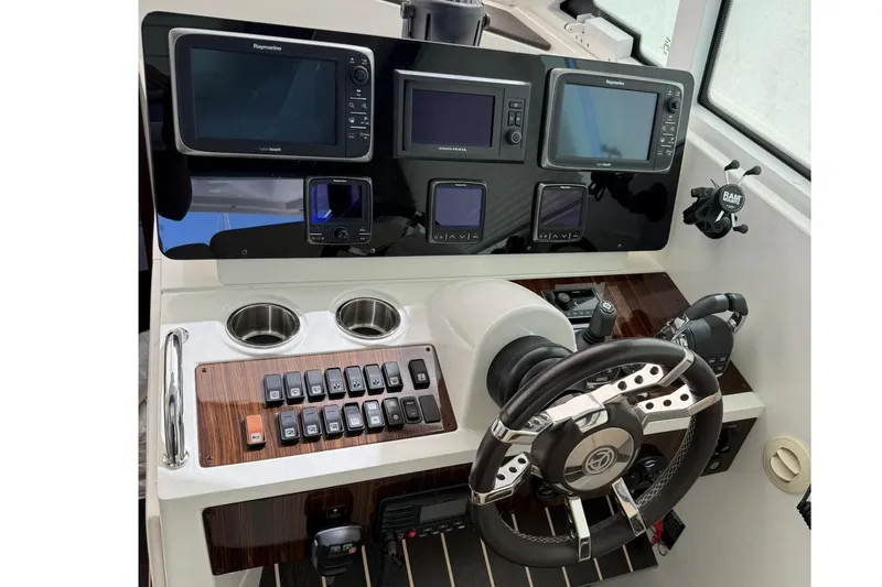 Osa Yacht Photos Pics Helm of 2012 Cruisers Yachts 41 Cantius with advanced navigation systems.