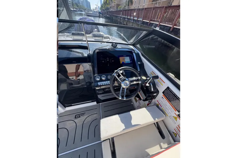  Yacht Photos Pics 2026 Granfort 300 GTS boat cockpit with modern steering and control panel.