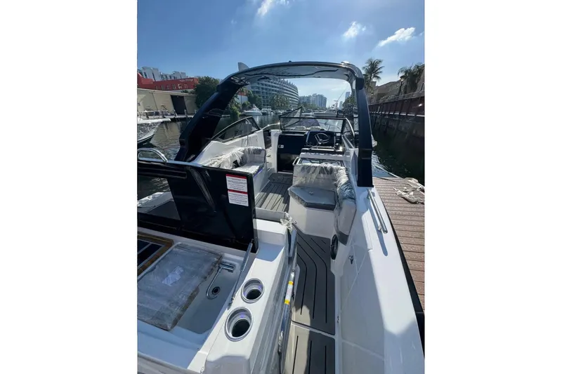  Yacht Photos Pics 2026 Granfort 300 GTS luxury boat docked under clear blue sky.