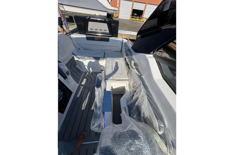  Yacht Photos Pics 2026 Granfort 300 GTS boat interior with protective coverings and modern dashboard.