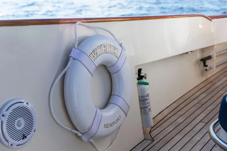 Wayfarer Yacht Photos Pics Lifebuoy on 2002 Hinckley Talaria 29C yacht deck, ocean in background.