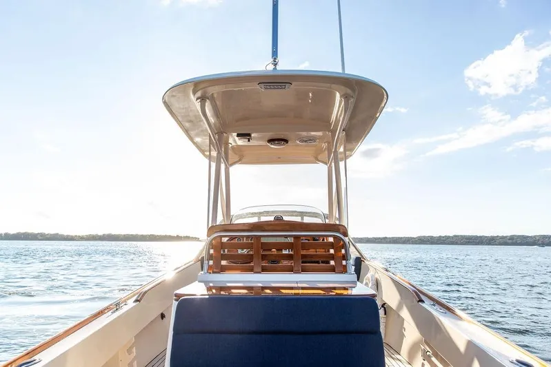 Wayfarer Yacht Photos Pics 2002 Hinckley Talaria 29C boat on calm water under clear sky.