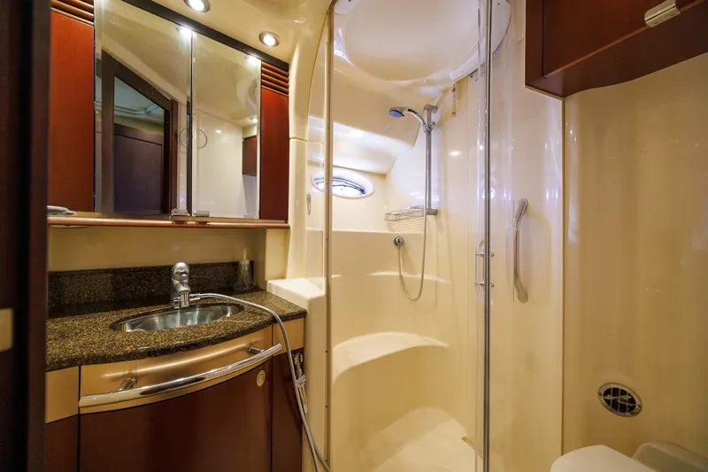 Zoe Grace Yacht Photos Pics Luxurious bathroom in 2006 Sea Ray 52 Sedan Bridge yacht with modern fixtures.