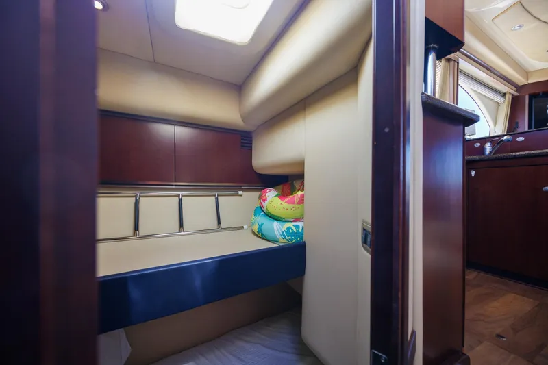 Zoe Grace Yacht Photos Pics Interior cabin of 2006 Sea Ray 52 Sedan Bridge yacht with cozy seating.