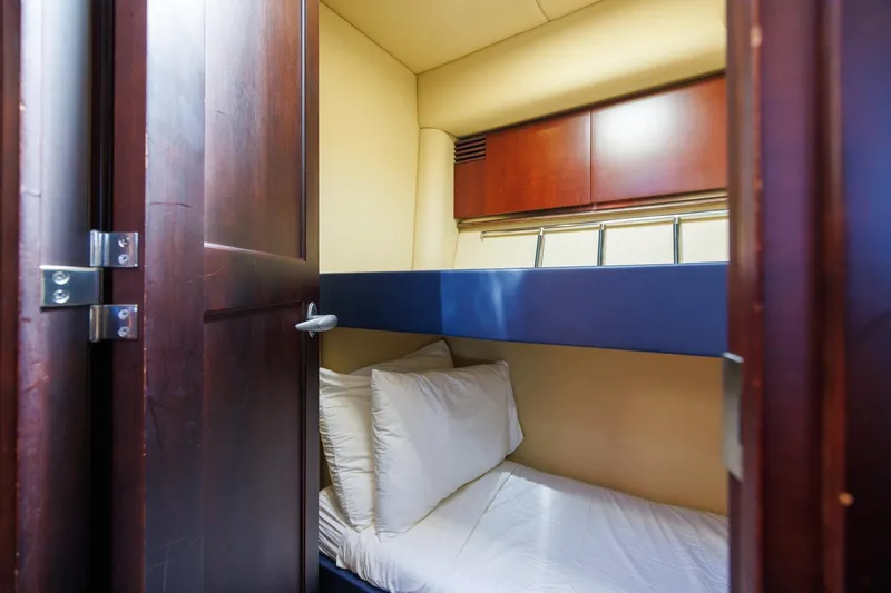 Zoe Grace Yacht Photos Pics Cozy bunk bed cabin in 2006 Sea Ray 52 Sedan Bridge yacht.