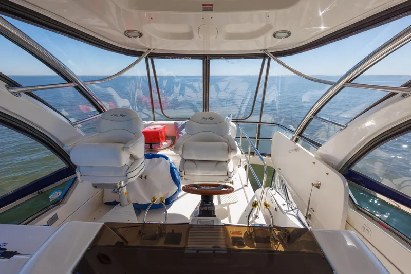 Zoe Grace Yacht Photos Pics Luxurious 2006 Sea Ray 52 Sedan Bridge yacht interior with panoramic ocean view.