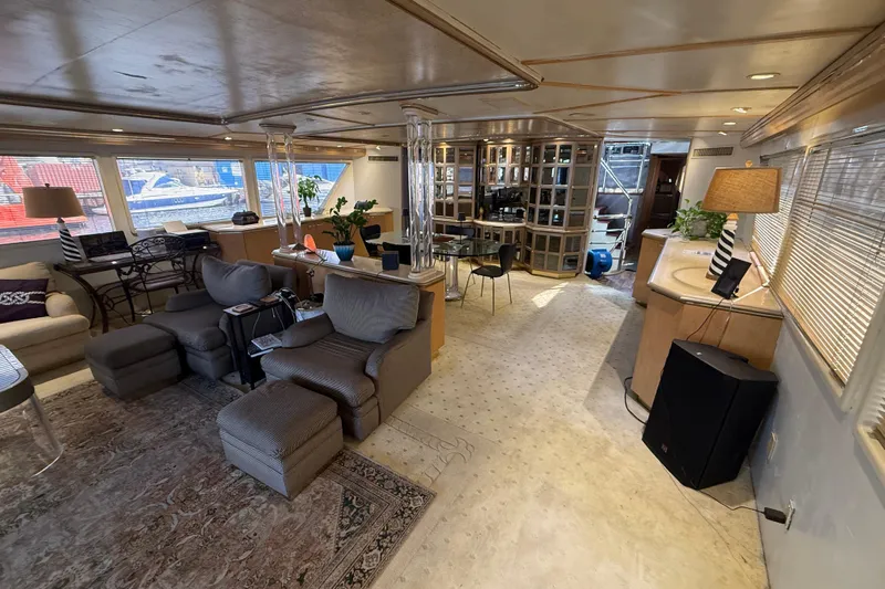  Yacht Photos Pics Luxurious interior of a 1990 Denison Pilothouse Cockpit Motoryacht with elegant seating and decor.