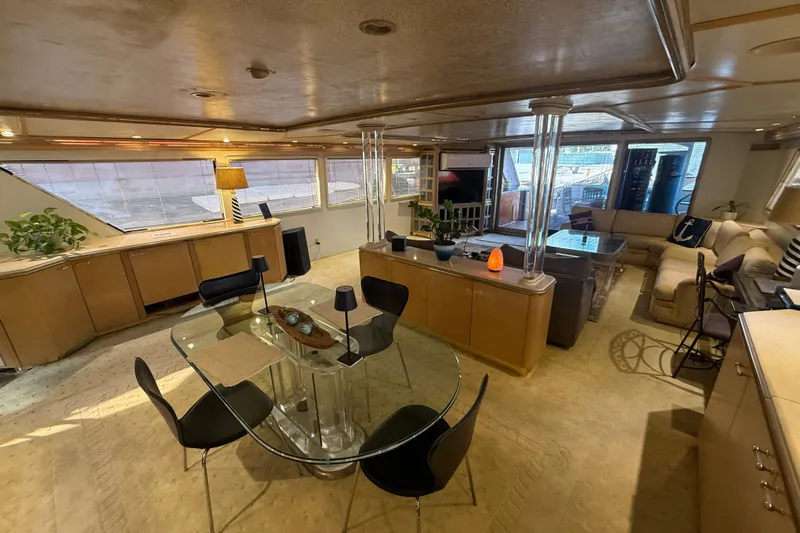  Yacht Photos Pics Luxurious interior of a 1990 Denison Pilothouse Cockpit Motoryacht with elegant furnishings.