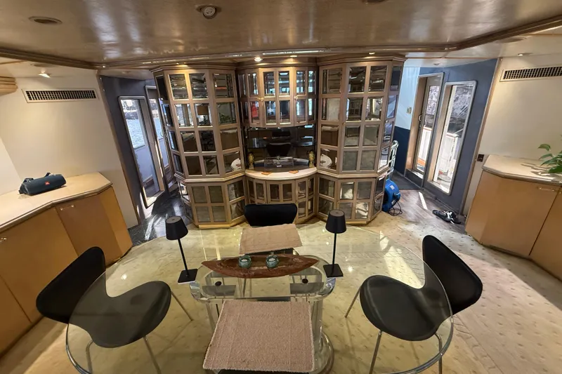  Yacht Photos Pics Luxurious interior of a 1990 Denison Pilothouse Cockpit Motoryacht with elegant furnishings.