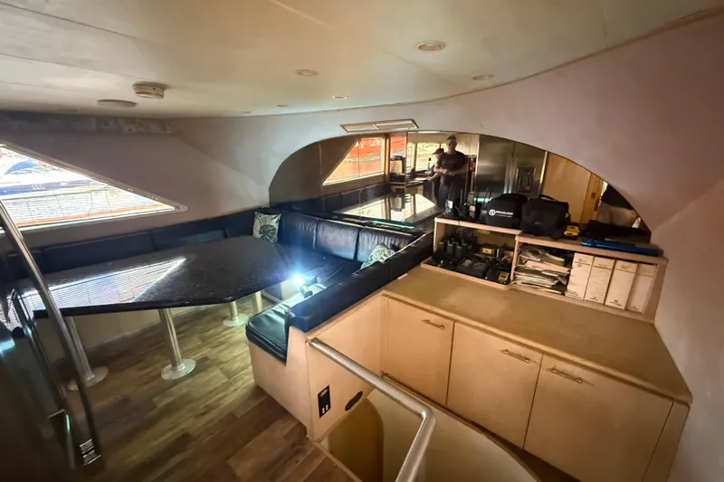  Yacht Photos Pics Interior of 1990 Denison Pilothouse Cockpit Motoryacht with seating and storage.