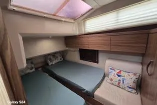 Green Eye Lady Yacht Photos Pics Interior cabin of 2019 Greenline 40 yacht with twin beds and modern decor.