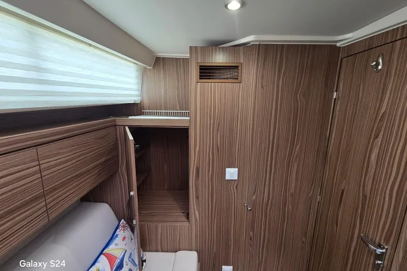 Green Eye Lady Yacht Photos Pics Interior of 2019 Greenline 40 yacht with wood paneling and modern design.