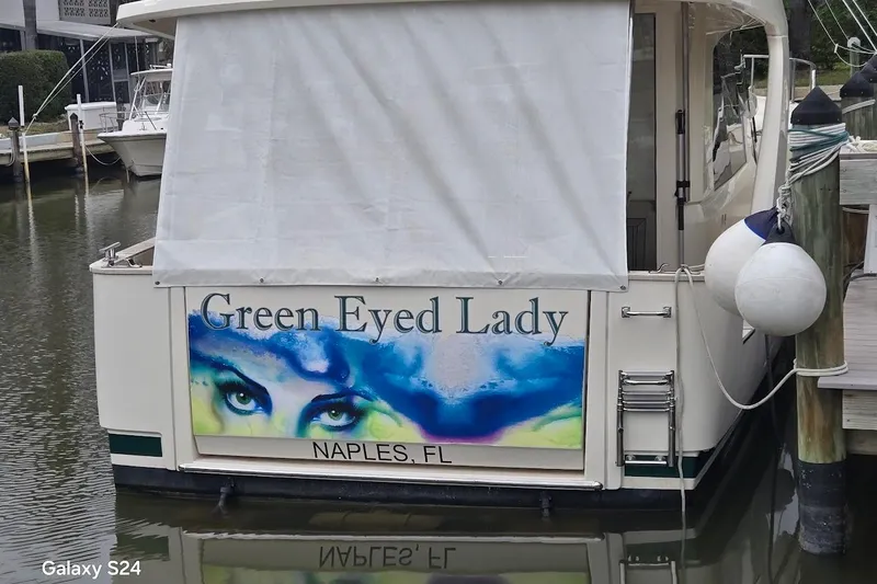 Green Eye Lady Yacht Photos Pics Greenline 40 boat named "Green Eyed Lady" docked in Naples, FL, 2019 model.