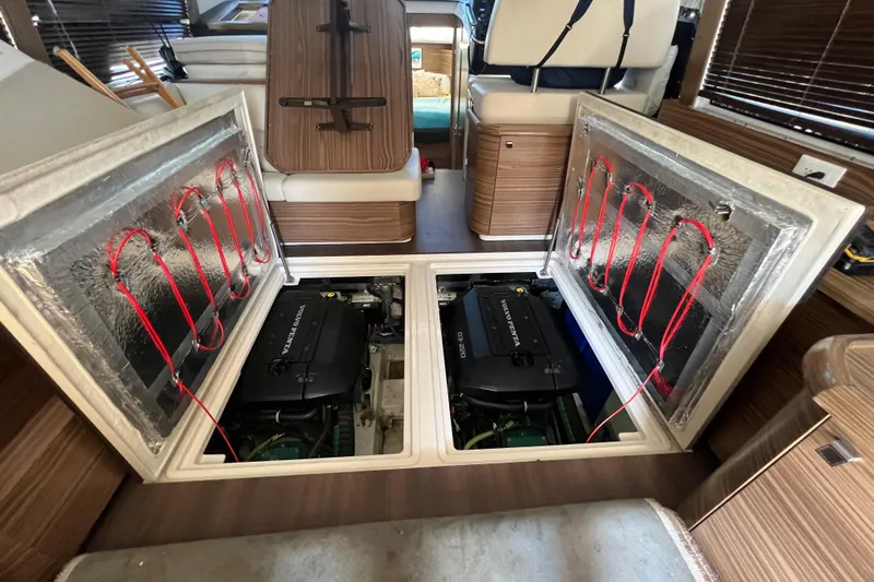 Green Eye Lady Yacht Photos Pics Engine compartment of a 2019 Greenline 40 yacht, showcasing dual Volvo Penta engines.