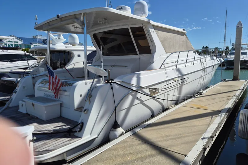  Yacht Photos Pics 2003 Navigator Californian Veneti yacht docked at marina under clear blue sky.