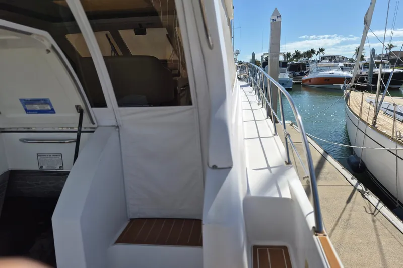  Yacht Photos Pics 2003 Navigator Californian Veneti yacht docked at marina, sunny day, clear skies.