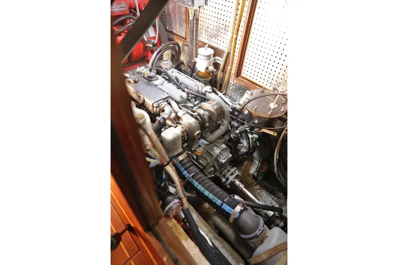 Oleta Yacht Photos Pics Engine room of 2005 Tayana 48 yacht, showcasing mechanical components and wiring.