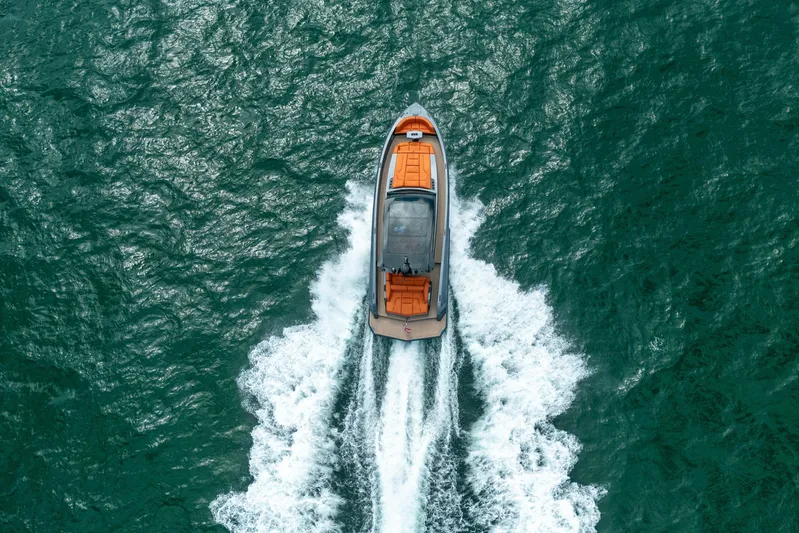 Pharmasea Yacht Photos Pics Aerial view of 2022 Vanquish Yachts VQ45 cruising on open water.