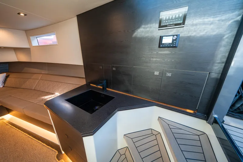 Pharmasea Yacht Photos Pics Luxurious interior of 2022 Vanquish Yachts VQ45 with modern design and sleek finishes.