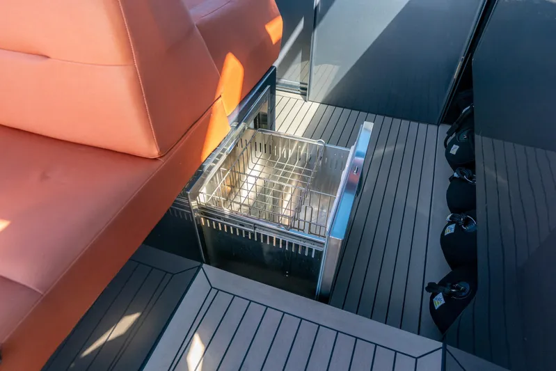 Pharmasea Yacht Photos Pics Luxury yacht Vanquish VQ45 interior with sleek seating and built-in storage, 2022 model.