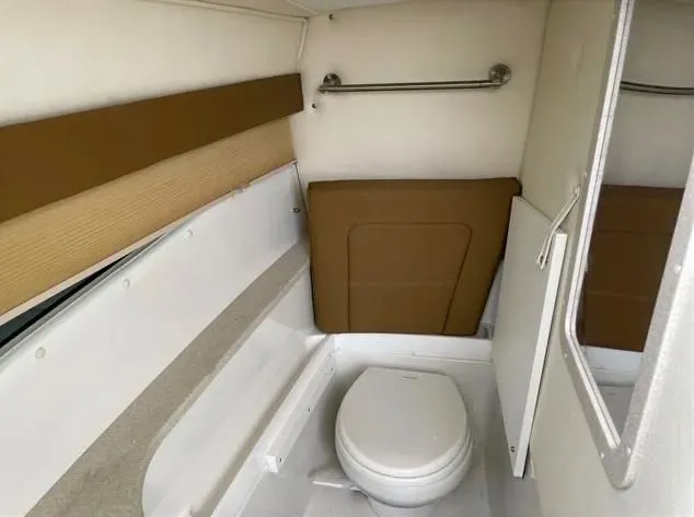  Yacht Photos Pics Interior of a 2018 Cobalt R35 with toilet and mirror.