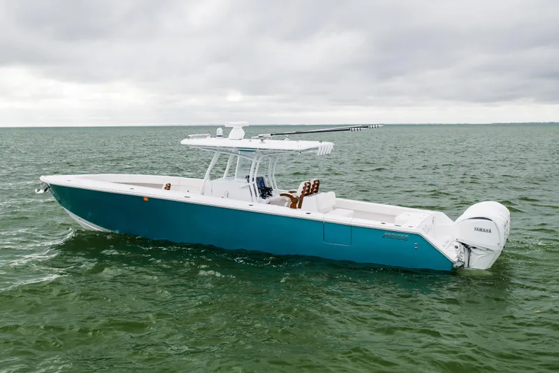  Yacht Photos Pics 2022 Jupiter 38 HFS boat on open water, featuring sleek design and Yamaha engines.