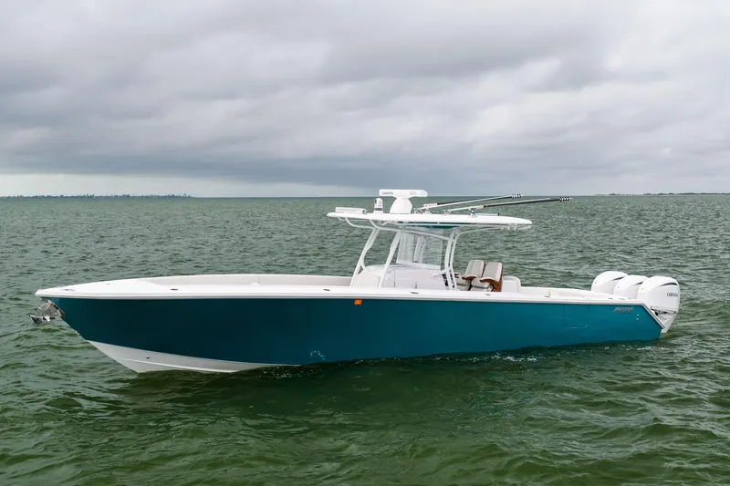  Yacht Photos Pics 2022 Jupiter 38 HFS boat on open water under cloudy skies.