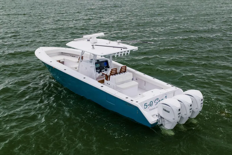  Yacht Photos Pics 2022 Jupiter 38 HFS boat with triple Yamaha engines on open water.