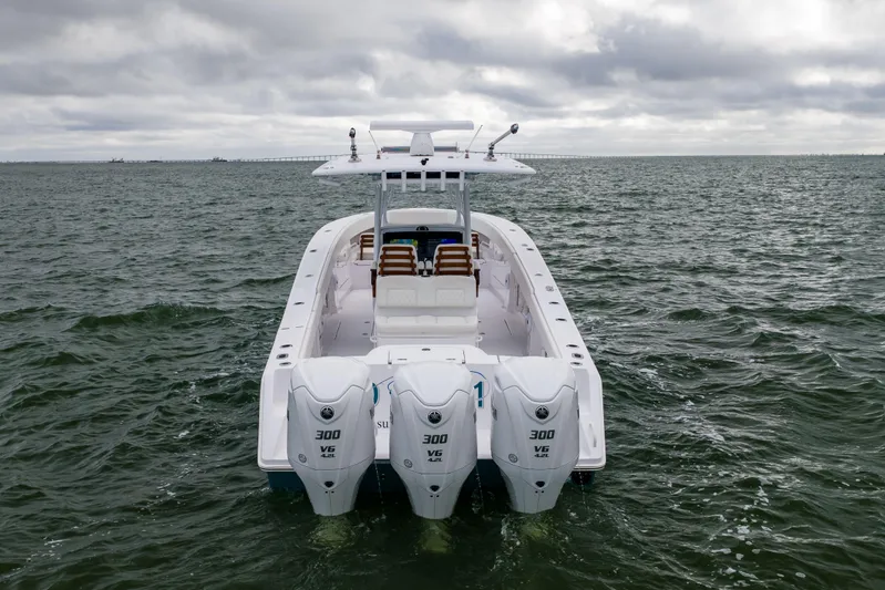  Yacht Photos Pics 2022 Jupiter 38 HFS boat with triple 300 V6 engines on open water.