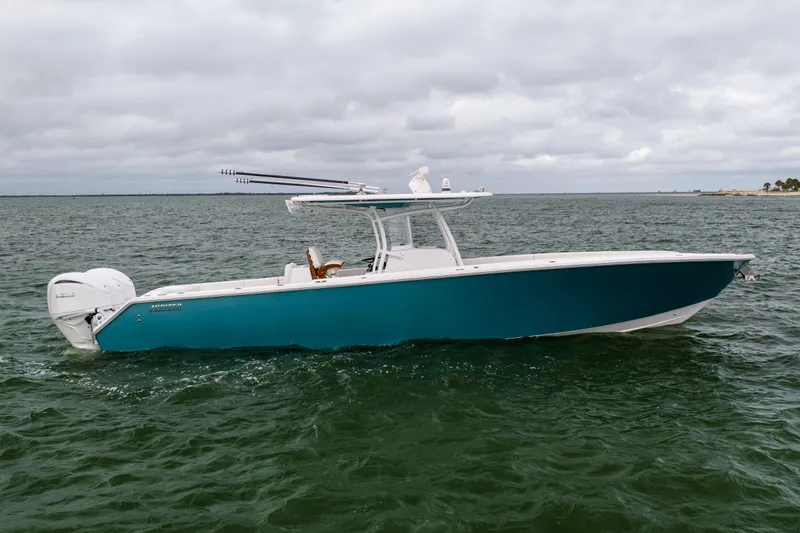 Yacht Photos Pics 2022 Jupiter 38 HFS boat on open water under cloudy sky.