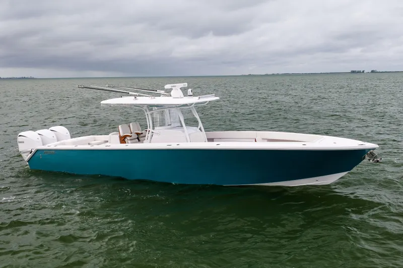  Yacht Photos Pics 2022 Jupiter 38 HFS boat on open water under cloudy sky.